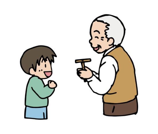 竹とんぼで遊ぶおじいちゃんと男の子